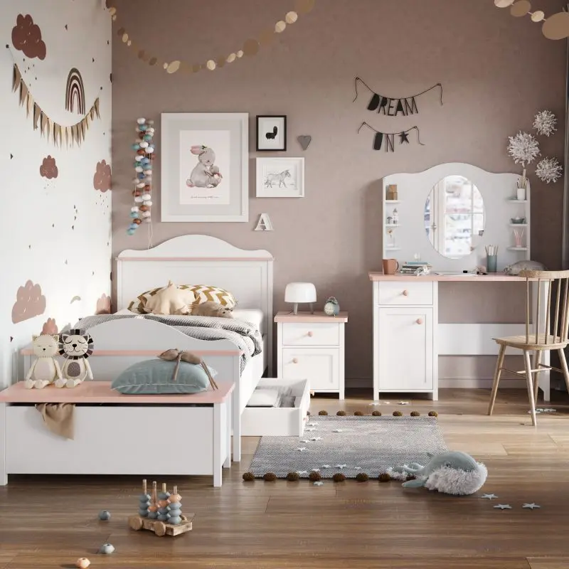 Children's bedroom set featuring a bed, dresser, chest, and vanity with a mirror, in white with pink accents